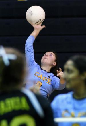 Cape junior setter Abbey Derrickson pounds a serve.
