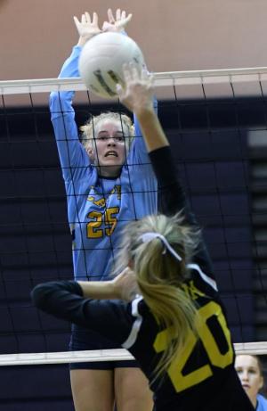 Freshman Rileigh Wilson roofs Pandua’s Jillian Timmons.