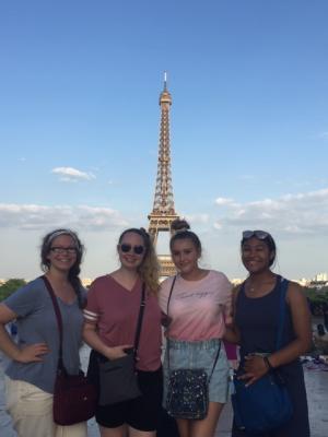 Girl Scouts In front of the Eiffel Tower are Carly Beres, Kathryn Buss, Angelina Garofalo and Synde Jenkins.