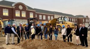 Elected officials who supported the expansion join the groundbreaking with (l-r) Bob Fulton; Lewes Mayor Ted Becker; Sen. Ernie Lopez, R-Lewes; Dave Helsdon; Andy Lewis; Roni Posner; Dean Johnson; Bill Collick; Brian Bassett; Jason Bradley; Alison Myers; Janis Hanwell; Janet Maull-Martin; Jessica Tyndall; Delaware Auditor of Accounts Kathleen McGuiness; Carl Krienen; and Bryan Williams.