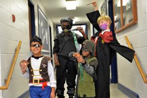 Taking an action shot in their character costumes are (l-r) Rawnak Brar, Berlin, Md.; Darius Jones, Salisbury, Md.; Rudolphe Crevecoeur, Seaford; and Samuel Baker, Salisbury.