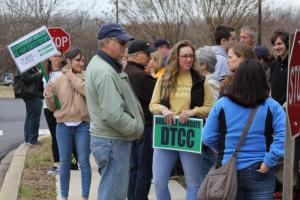 More than two dozen people gathered in front of Delaware Tech President Mark Brainard’s office on the Terry Campus in Dover.