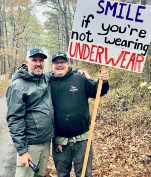 When you’re running a marathon, it’s good to stay loose. Surfgimp Foundation volunteers Brad Dennehy, left, and Mike D'Antoni are happy to provide some levity.