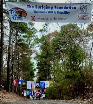 The Surfgimp Foundation is a sponsor of the marathon’s Flag Alley.