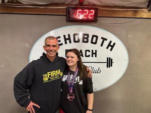Paul Timmons and Samantha Hunker smile after Hunker placed second at the 2023 USA Powerlifting Delaware State Championships.