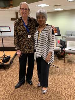First Town Club Vice President Barbara Rudd, left, welcomes guest speaker Lois Powell, a founding member of The Chantels.