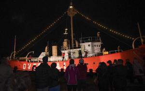 The Overfalls Foundation crew says out with 2022 and in with 2023, as a lit anchor is lowered to the deck at the stroke of midnight. DAN COOK PHOTO