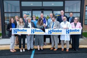 Ribbon-cutting attendees shown are (l-r) Danielle Taylor, BMG quality program manager; Betsy Reamer, Lewes chamber; Hayley Prillaman, practice manager; Matthew Corrozi, director of primary care; Kay Young, Beebe Medical Foundation executive director of development; Kathy Tregear, RN, interim chief nursing officer; endocrinologist Joanna Khatib, MD; Ann Raskauskas, Beebe Medical Foundation board; Mike Meoli, Beebe board of directors chair; Anthony Buonanno, MD, BMG chief medical officer; Sen. Russ Huxtable, D-Lewes; Paul Sierzenksi, MD, chief physician executive; David A. Tam, MD, president and CEO, and Sara Larch, vice chair, Beebe board of directors. SUBMITTED PHOTO