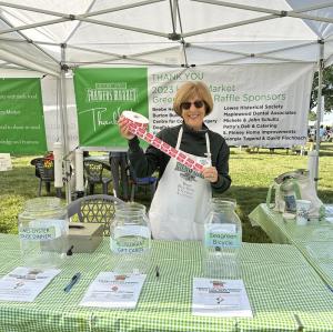 Volunteer and advisory board member Denise Poslusny is ready to sell tickets for the HLFM Big Raffle, returning this season with some favorite prizes.