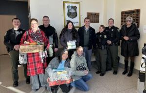 Police officers and Williams Insurance Agency representatives gathered in the RBPD lobby are in back (l-r) Patrolman Rocco Esposito, Linda Travers, Lt. Mark Sweet, Maria Schaeffer, agency owner Steven Harvey, Master Cpl. Susan Gladmon, Sr. Cpl. Josh Kosiorowski and Janet Dunn. In front are Priscilla McCole and Caryn Marcinizyn.