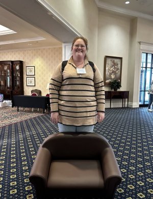 Prekindergarten teacher Bethany Tyndall pauses for a photo as a memento of the conference.