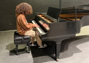 Erinn Rodriguez gives the new piano a try.