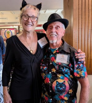 Cathy Mason shares a smile with Magic Jack Noel, who helped emcee the fundraiser.
