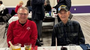 Elks member Dan Gulden, left, enjoys the dinner and program with his 95-year-old father Bill Gulden, a Korean War veteran.