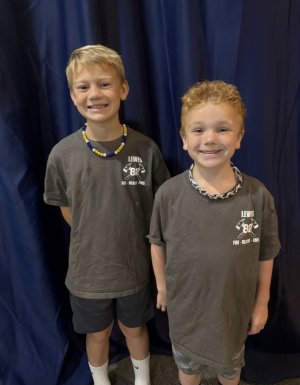 Showing the front design of the Lewes Fire Department T-shirts are Wyatt Wilkinson, left, and Lincoln Wilkinson.