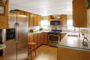 BETHANY BEACH, INVESTMENT OPPORTUNITY, PORCH, PATIO, COASTAL COMMUNITY, DELAWARE HOMES, DELAWARE REAL ESTATE, DELAWARE BEACHES, COMMUNITY AMENITIES, REAL ESTATE, HOUSE HUNTING, OUTDOOR SHOWER, WATERFRONT COMMUNITY, BOAT DOCK