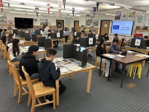 Mariner seventh-graders assemble in the school library to participate in the gallery walk highlighting key components of the Civil Rights Movement.