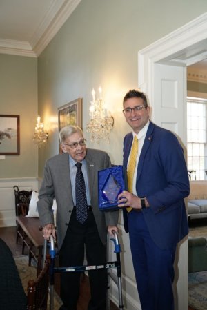 Former Levy Court President Brooks Banta, left, receives the Order of the First State from Gov. Matt Meyer.