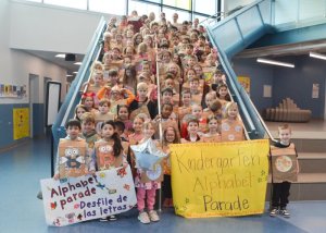 Kindergarteners pose for a group photo after the parade.