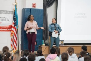Detective Krystle Wideman, left, shares information with H.O.B. fourth-graders about her experience solving mysteries as a police officer. With her is Detective Elizabeth Zambrano, H.O.B. school resource officer.