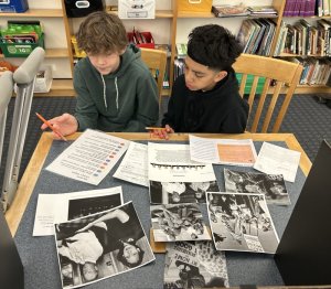 Students Ezra Olmsted, left, and Gael Gomez-Garcia work together to answer questions about Loving v. Virginia.