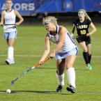 Cape senior Amanda Atkinson takes control in the midfield. BY DAN COOK