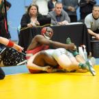 The official signals "two" in overtime, giving Cory Lawson the 160-pound state title. BY DAVE FREDERICK