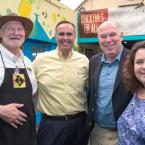 Teller Wines owner Kevin Hester, (l-r) Sen. Ernie Lopez, Rep. Pete Schwartzkopf, and Lula Brazil owner Meg Hudson enjoy a moment during the Expo. BY DENY HOWETH
