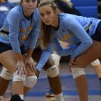 Abbey Derrickson, left, and Katie Knarr await a Dover serve.