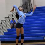 Cape junior Simran Patel serves an ace in the fifth set.