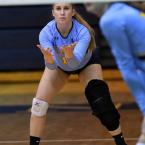 Senior Abby Bucklin awaits a service return.