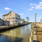 BETHANY BEACH, INVESTMENT OPPORTUNITY, PORCH, PATIO, COASTAL COMMUNITY, DELAWARE HOMES, DELAWARE REAL ESTATE, DELAWARE BEACHES, COMMUNITY AMENITIES, REAL ESTATE, HOUSE HUNTING, OUTDOOR SHOWER, WATERFRONT COMMUNITY, BOAT DOCK