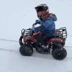 Christopher Kapusniak, 4, rides his four wheeler in Milton in this photo from mom Jeanna Kapusniak.