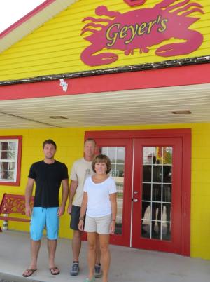 Third and fourth generation restauranteurs, (l-r) Jordan, Bruce and Susan Geyer, jumped back into the industry this year with the opening of Geyer's Seafood Market in the former home of Jimmy Lynn's seafood at 18226 Coastal Highway in Lewes. BY MOLLY MACMILLAN