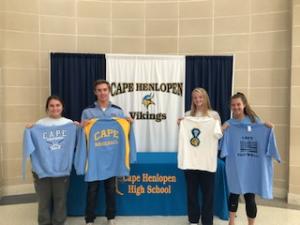 Students pose with donated apparel