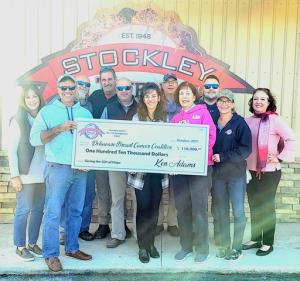 Check presentation attendees representing Stockley Tavern and the Delaware Breast Cancer Coalition are (l-r) Tracy Adams, Steve Smyk, Jack Mullins Sr., Randy Wothers, Chess Hedrick, Francesca Vogel, Ken Adams, Connie Holdridge, Lance Mears, Donna Dennis-Vandenheuvel and Meghan Fitzgerald. SUBMITTED PHOTO