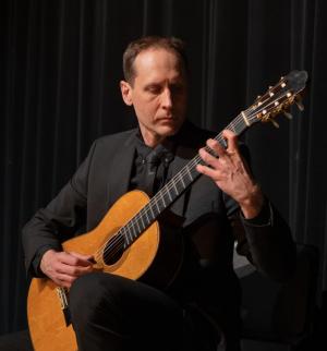Composer and guitarist Andrew Dickenson will take guests through his musical process during a May 20 fireside discussion at Lewes Public Library. SUBMITTED PHOTO