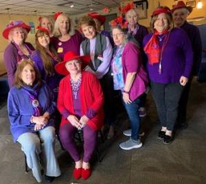 Red Hat Society Evening Primroses chapter members shown are in back (l-r) Linda Atkinson, Elsie Parkhouse, Judy Phillips and Peggy Scheiber. In the middle are Laura Thomas, Kathy Desbonnet, Glenna Gill, Joann Mcilvain, Judy Picciotto and Karen Norris. In front are Vice Queen Mae Cipriano and Queen BJ Young. Not pictured are Vivianna Matthews, Eileen Loftus, Ann Burton, Pat Faust, Connie Crisofulli and Lorie Conner. SUBMITTED PHOTO