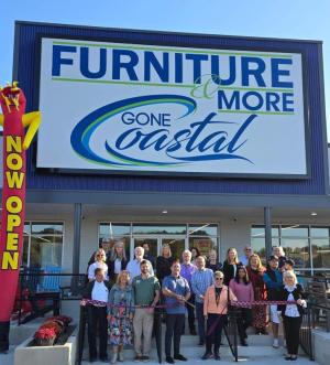 Ribbon-cutting attendees shown in back are (l-r) Jeremy Brown, Stephanie Hudson, Mike Arroyo, Carol Jasinski, Maria Carr, Barbara Steele, Susan Mutz, Randall Cash and Debbie Balick. In middle are Katie Brittingham; Ron Gebhart; Dave Gaviggan and John McCahan, co-owners of Furniture & More; Natasha Massey, district manager; Arturo Santos; and Erika Hernandez. In front are Art Blanchette; Nadine Timpanaro; Dakota Kellermeyer; Jack McCahan, Millsboro store manager; Deborah Thompson, Rehoboth store manager; and Lynn Szklanny. SUBMITTED PHOTO