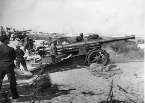 The four-gun battery of 155mm GPF artillery is fired during a drill at Fort Miles in December 1941. SOURCE: NATIONAL ARCHIVES AND RECORDS ADMINISTRATION