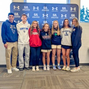 Seven Sussex Academy student-athletes signed to play their respective sports at the collegiate level. They are (l-r) Christian Wright (Saint Peter's, swimming), Chase Ballinger (Elizabethtown, soccer), Kacie Rawlings (Lynchburg, field hockey), Victoria Evans (Bloomsburg, swimming), Delainie Monitzer (Delaware Tech, softball), Shea Danahy (Washington & Lee, Llacrosse) and Ryan Lowe (Salisbury, field hockey). AARON R. MUSHRUSH PHOTOS