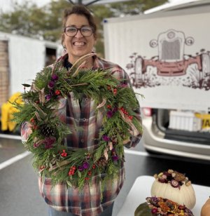 Derby Mill Farm Botanicals co-owner Vicki Cronis-Nohe displays a handcrafted holiday wreath. SUBMITTED PHOTOS
