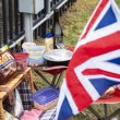 At the British car show you must have snacks, and don't forget the Grey Poupon.