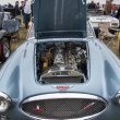 The compact 1963 Austin Healy engine is on display.