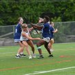 Ally Diehl reaches around and scores 