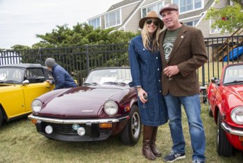 Lewes locals Cristen and Douglass Owen pose with their Triumph Spitfire 1500 