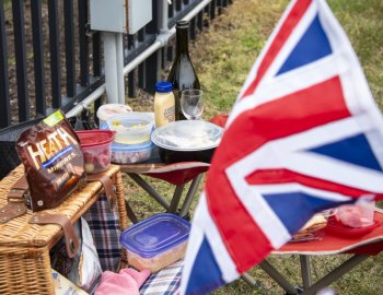 At the British car show you must have snacks, and don't forget the Grey Poupon.