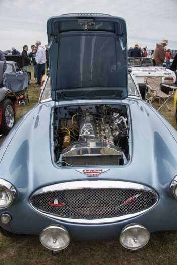 The compact 1963 Austin Healy engine is on display.