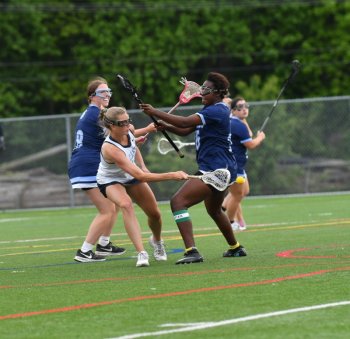 Ally Diehl reaches around and scores 