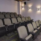 A 25-seat theater will be used by staff during training and inservice days, and will transform into a movie theater for kids at night.